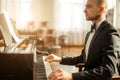 Talented young pianist man practicing