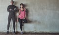 Talk about fit and fierce. Portrait of a sporty young couple exercising together outdoors. Royalty Free Stock Photo