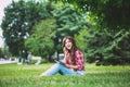 Talk on the phone in the park. Internet / Communications / communion.