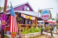 Talkeetna Alaska USA - Resturant Mountain High Pizza Pie in cabin with puple siding wash your hands here sign and