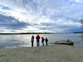 Talkeetna, Alaska, USA - September 4, 2022 - A family enjoying the views at beautiful lake in Talkeetna, Alaska