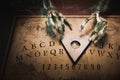 Talking board and planchette Royalty Free Stock Photo