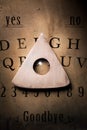 Talking board and planchette Royalty Free Stock Photo