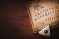 Talking board and planchette Royalty Free Stock Photo