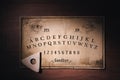 Talking board and planchette Royalty Free Stock Photo