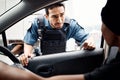 Talking, drivers license or policeman in city to check info for law enforcement, protection or street safety. Questions Royalty Free Stock Photo