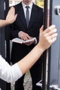 Talking Jehovah's witness to leave her house Royalty Free Stock Photo