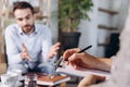 At a psychologist& x27;s appointment. Married couple, sad, depressed man and woman meeting with consultant to solve family Royalty Free Stock Photo