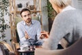 At a psychologist& x27;s appointment. Married couple, sad, depressed man and woman meeting with consultant to solve family Royalty Free Stock Photo