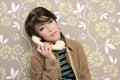 Talking telephone retro woman on vintage wallpaper