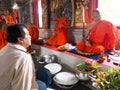 Talking with Thai monk in temple Royalty Free Stock Photo