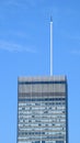 Tall antenna on skyscraper