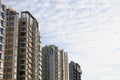 Tall apartment buildings against a horizon and skyline