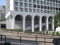 Tall arches and square windows on Hong Kong building