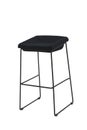 Tall black bar stool isolated on white. Modern designer Bar chair. Royalty Free Stock Photo