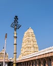 Tall, brass lamp post in front of Virupaksha temple, Hampi, Karnataka,India Royalty Free Stock Photo