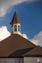 Brown opened steeple over a church building Royalty Free Stock Photo