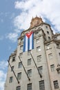 Tall building with a cuban flag