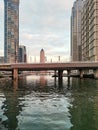 Numerous skyscrappers and bridges connecting the banks of a river in Dubai