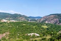 Tall cars bridge in mountains of Corfu island