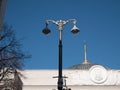 Tall city lantern with two security cameras in front of parliament government building in Kiev - Verkhovna Rada, Supreme Council