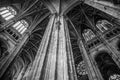 Tall columns and beautifully ornate ceiling in the gothic church Saint Eustache in Paris Royalty Free Stock Photo