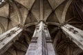 Tall columns and beautifully ornate ceiling in the gothic church Saint Eustache in Paris Royalty Free Stock Photo