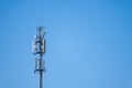 Tall communications tower in a forest.. Royalty Free Stock Photo