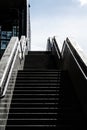 Tall concrete stairs in sunshine..