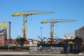 Tall cranes in shipbuilding yard Royalty Free Stock Photo