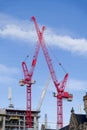 Tall cranes at new office construction in Glasgow city centre Royalty Free Stock Photo