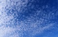 Tall Cumulus white clouds against a sky