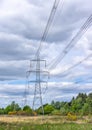 Line of electricity pylons in countryside Royalty Free Stock Photo
