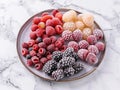 tall elegant plate with frozen berries