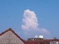 Tall erect cumulus cloud in the distance Royalty Free Stock Photo
