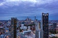 Tall financial skyscrapers surrounded by small buildings in the beautiful city of London on a cloudy day with blue sky Royalty Free Stock Photo