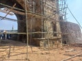 restoration work in progress of the ruins of Mohar Garh fort situated on a hill