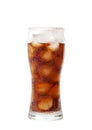 Tall glass with cola drink with chunks of ice isolated on white