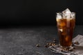 tall glass cold brew coffee with ice on black Royalty Free Stock Photo