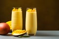 Tall glasses filled with a creamy mango lassi. Ai Generated.NO.04