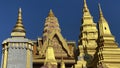 Tall golden Buddhist stupas and towers, Phnom Penh