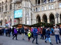 Tall gothic building of Vienna city hall Rathaus and traditional Christmas market Royalty Free Stock Photo