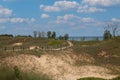 Tall grasses growing on hills of sand dunes, along the Kohler Dunes Cordwalk Trail, in front of Lake Michigan in Wisconsin Royalty Free Stock Photo