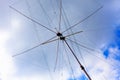 Tall Ham radio antenna against cloudy sky Royalty Free Stock Photo