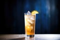 tall iced tea glass backlit with a bright glow Royalty Free Stock Photo