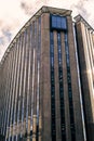 Tall imposing concrete office block in the city