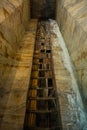 Tall impressive wall in Slanic Prahova salt mine, underground extraction pit, Romania Royalty Free Stock Photo