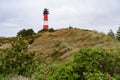Tall lighthouse Hornum on Sylt island, Baltic Sea, Germany Royalty Free Stock Photo
