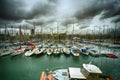 Tall luxury boats and yachts moored in duquesa Port In Spain. Barcelona Royalty Free Stock Photo