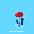 A tall man in a business suit is holding an umbrella over other people protecting them Royalty Free Stock Photo